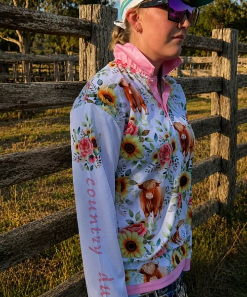 Highland Cow pink polo. Designed to look elegant while out working & designed for rugged everyday wear